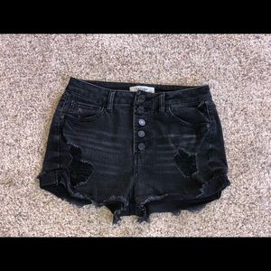 Washed black, high waisted, distressed jean shorts